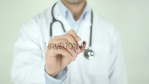 Doctor Writes Handicapped on Glass Surface