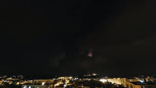 Time Lapse Lightning in the Sky at Night During a Storm Over the City