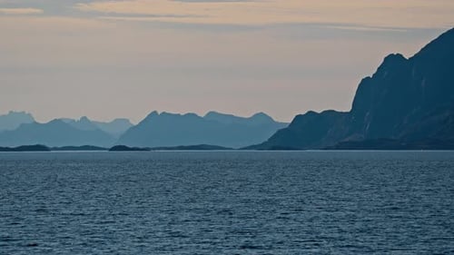 Hazy Peaks On The Horizon During Ferry Travel