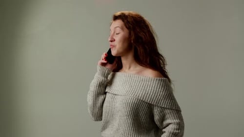 Pleasant Young Red Hair Girl Talking Smartphone Isolated on Gray Color Background Attractive Lady