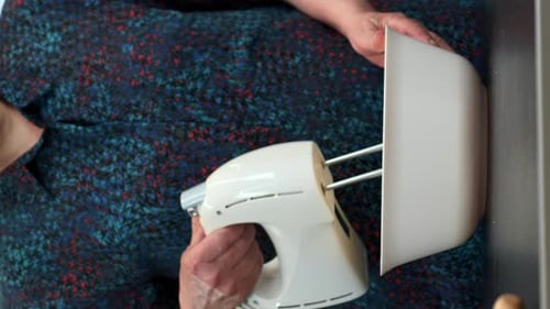 Using Electric Mixer in Kitchen