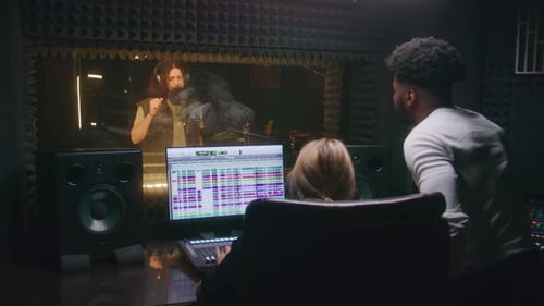 Audio Engineer and Producer Work in Studio
