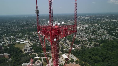 Tall radio tower overlooking city