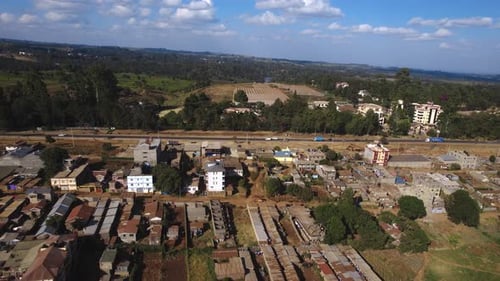 Aerial Shot Of Beautiful Residential Area With Green Nature Near Highway