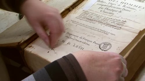 Examining Antique Book, Restoration and Preservation