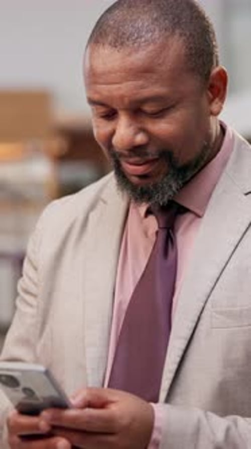 Business, happy black man and typing with phone in hotel lobby for client appointment
