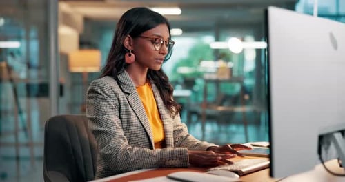 Media agency, computer and woman in office, planning or copywriting and email for submission