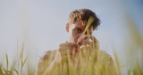 Farmer Examining Crops Wheat Field Agriculture Harvesting