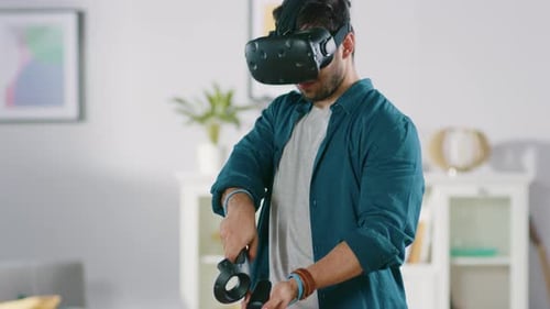 Man Experiencing Virtual Reality in Bright Living Room