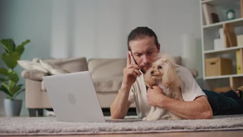 WorkLife Integration Calm Focus Man Works From Home With Dog Beside Him