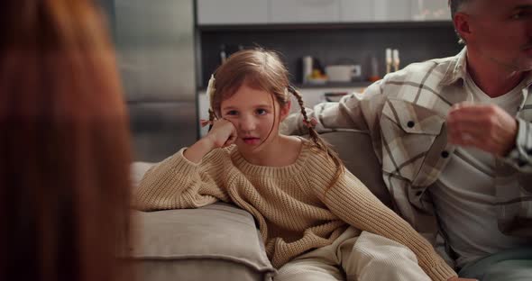 Sad Angry Little Girl Quarrels with Her Parents and is Indignant About ...