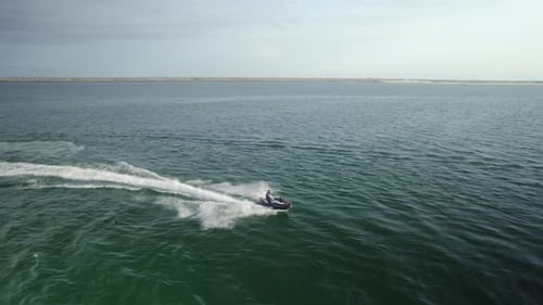 Man riding a jetski in the water