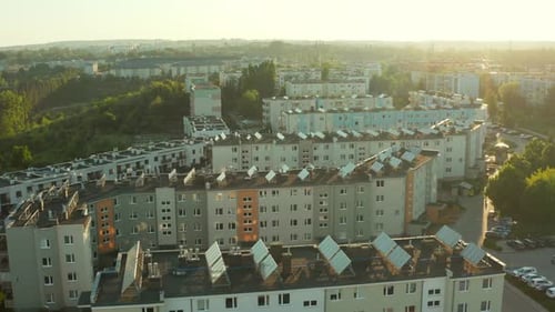 Aerial View of City Apartments with Solar Panels