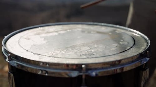 Drum Hit with Water - Drummer