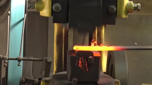 The Machine Automatically Hits The Hot Iron