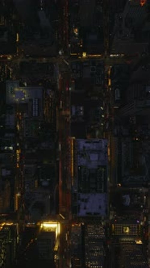 Aerial Views Capture Streets and Iconic Landmarks in Manhattan New York City at Night in Slow Motion
