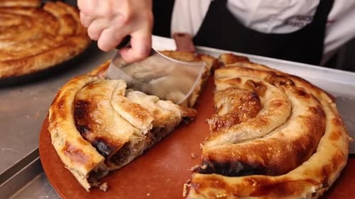 Delicious burek in a Balkan café. A typical Balkan dish. Close-up