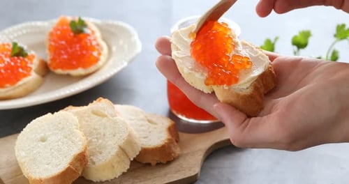 Caviar Appetizer Preparation with Butter and Bread