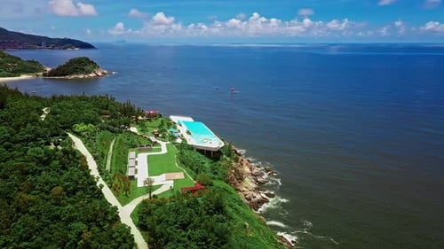 Aerial Top view of a transparent blue sea with beautiful waves at sunny day in summer. air of ocean