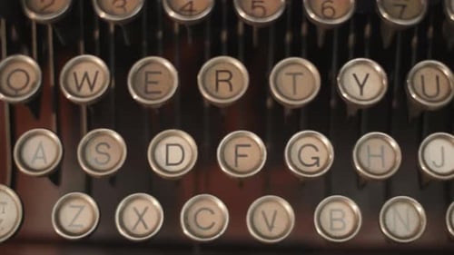 Vintage Underwood Typewriter keys from above. Camera pans from left to right from above a vintage ty