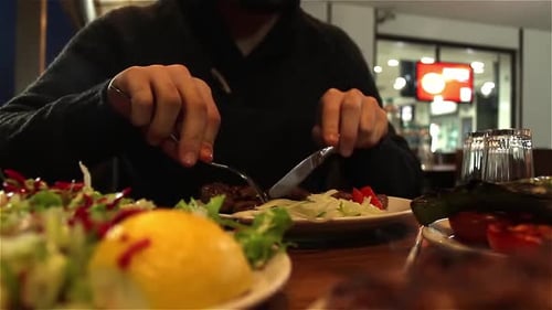 Eating Dinner in Restaurant