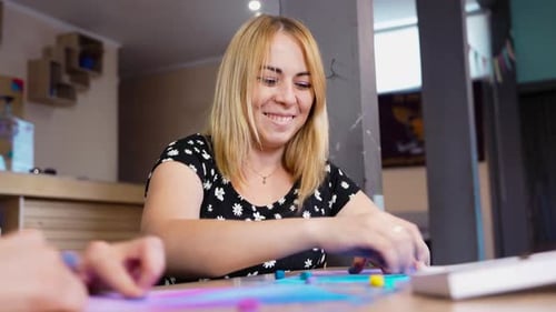 Woman Doing Arts and Crafts at Table