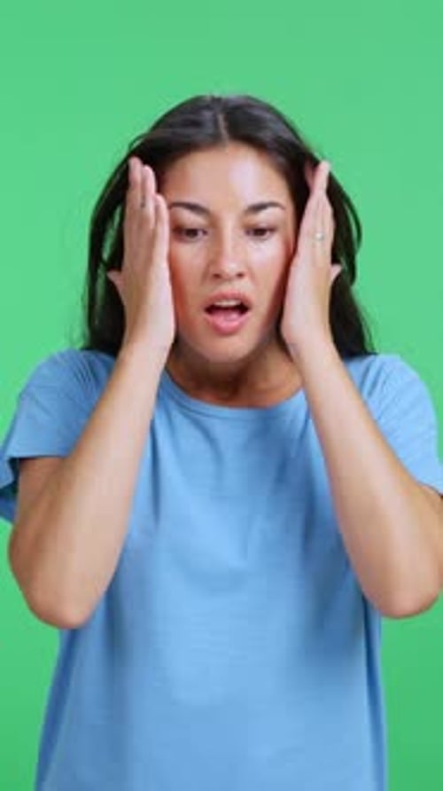 Surprised Woman Reacting with Shock and Excitement on Green Screen