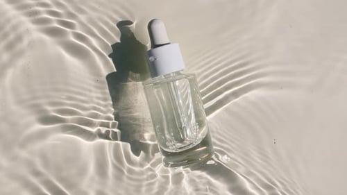 Cosmetic Serum with Rippling Water Shadows