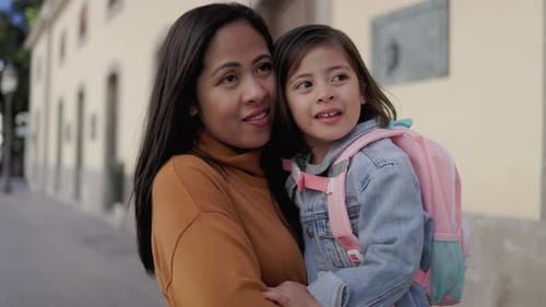 Happy Asian child girl walking school with mother in the city - Family education concept