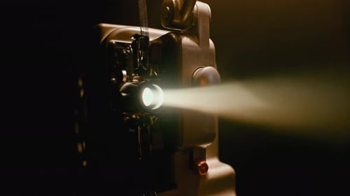 Vintage Film Projector Shines Bright Light