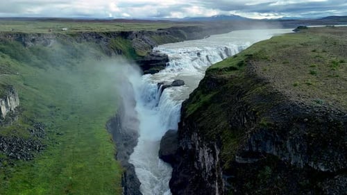 Majestic Gullfoss Waterfall Rushing Through the Rugged Landscape of Iceland