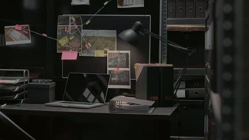 Detective's Desk with Investigation Evidence