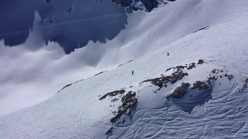 Epic View of Intrepid Off-Piste and Backcountry Skiers – 4K Drone Video