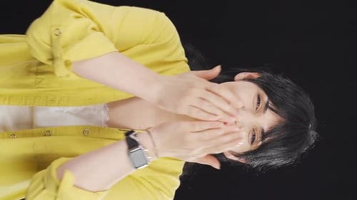 Smiling Young Woman Clapping in Portrait Video