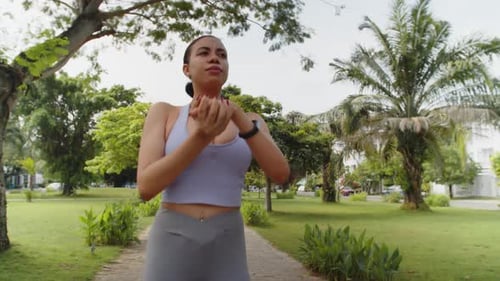 Female Athlete Practicing Body Warm Up in Park