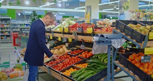 Single Middleaged Man Shopping in Supermarket Buying Vegetables Taking Tomatoes Prores