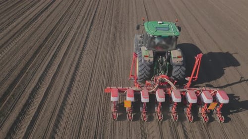 Cultivating tractor in the field