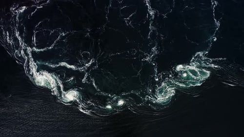 Waves of Water of the River and the Sea Meet Each Other During High Tide and Low Tide