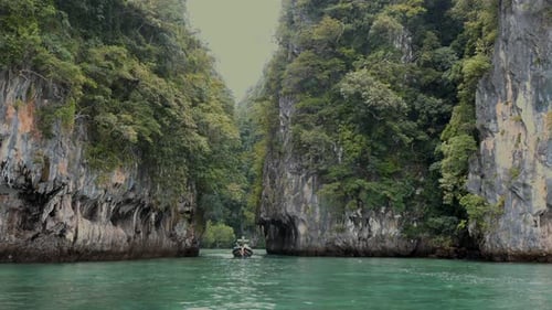 Boat with Tourists on Travel Tour on Tropical Islands in Thailand