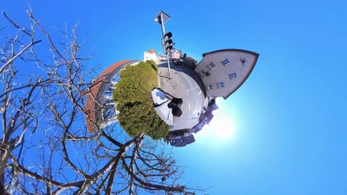 Little Tiny Planet 360 Small World View Of A Man Walking Past Corner In City In 4K