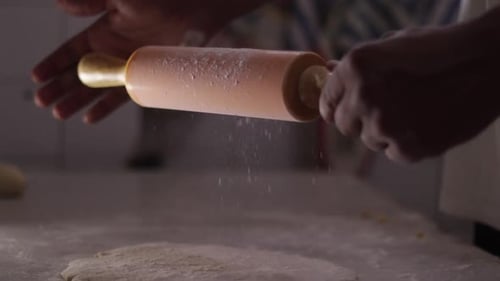 Preparing Dough with Rolling Pin in Cozy Kitchen