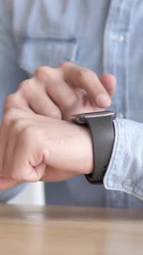 Close up of Using Smartwatch, Vertical Video