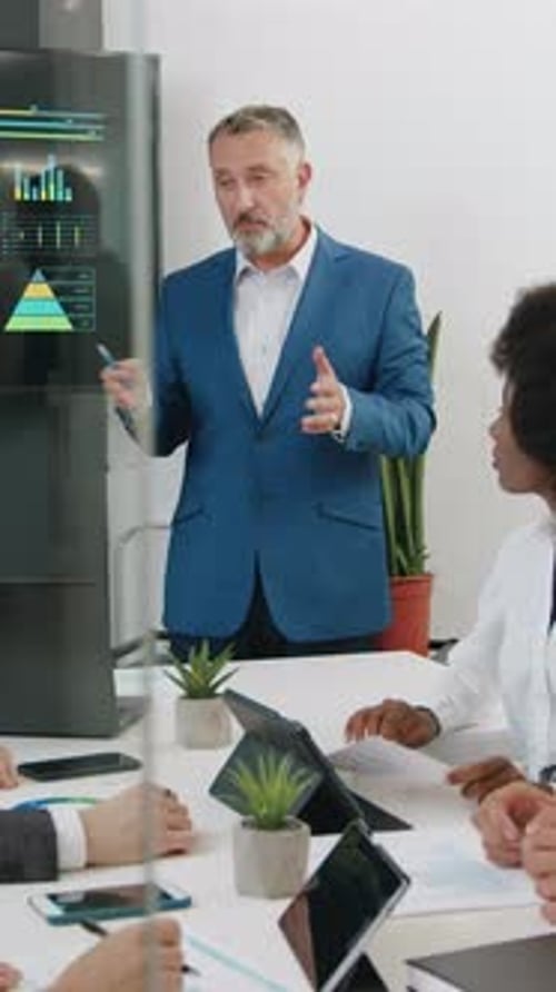 Front View of Attractive Purposeful Attentive Multiethnic Business People Which Sitting in