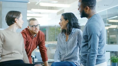 Diverse team members in a modern office space