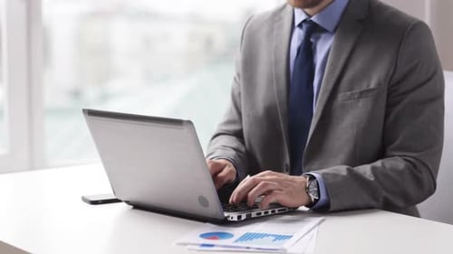 People, Business, Technology and Office Work Concept - Close Up of Businessman