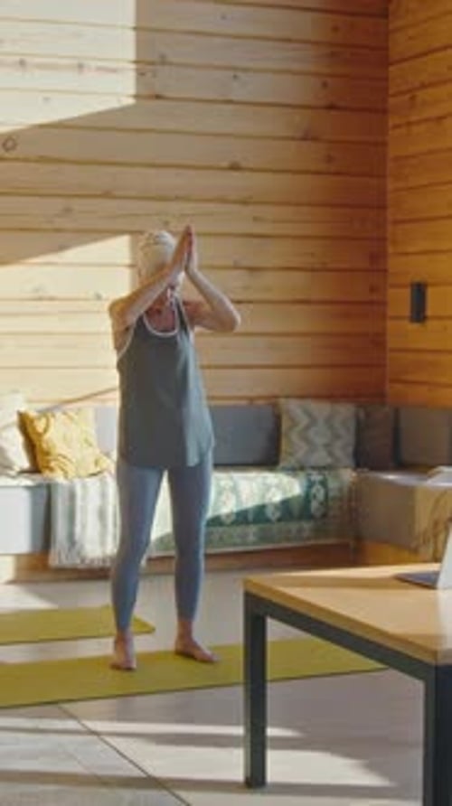 Senior Woman Doing Yoga at Home