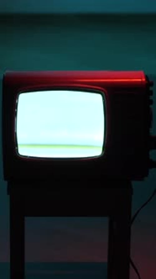 Retro Television with Static in Dark Room