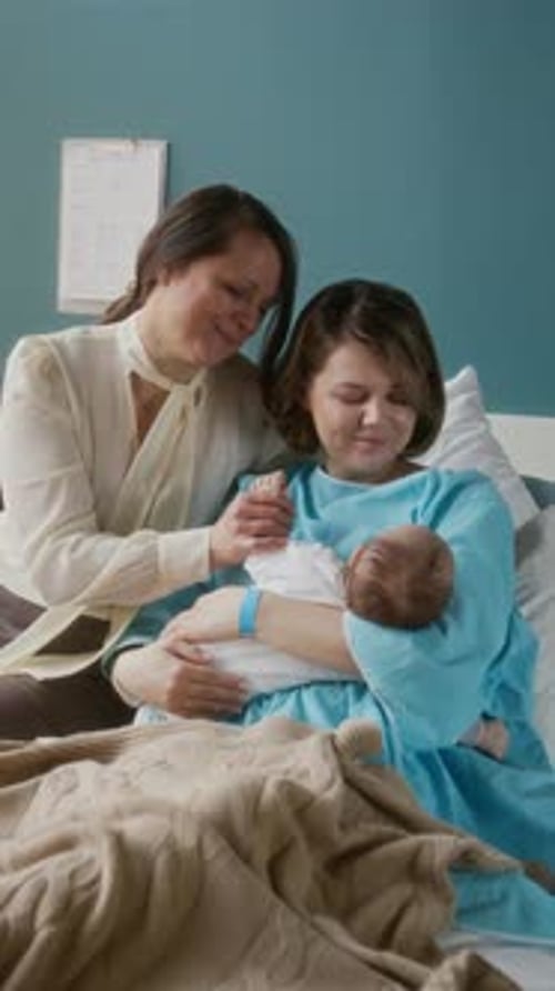 Woman Visiting Daughter in Maternity Hospital