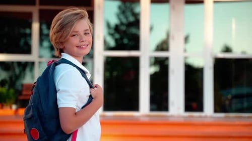 Portrait of Middle School Preteen Student Child Boy Girl with Backpack Looking at Camera Smiling in