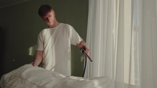 Young Adult Steams Mattress in Bedroom